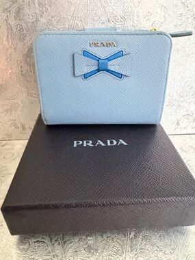 Prada Light Blue Saffiano Leather Zip Wallet with Blue Bow